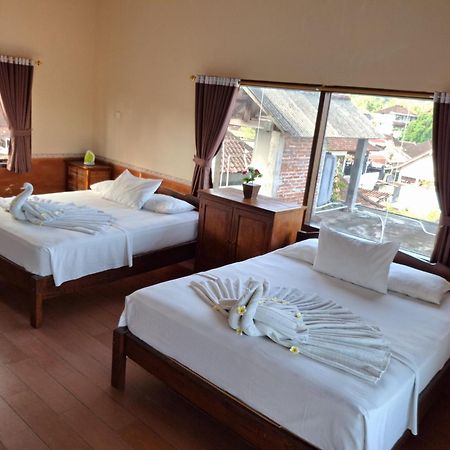 Dharma Homestay ปาดังไบ ภายนอก รูปภาพ