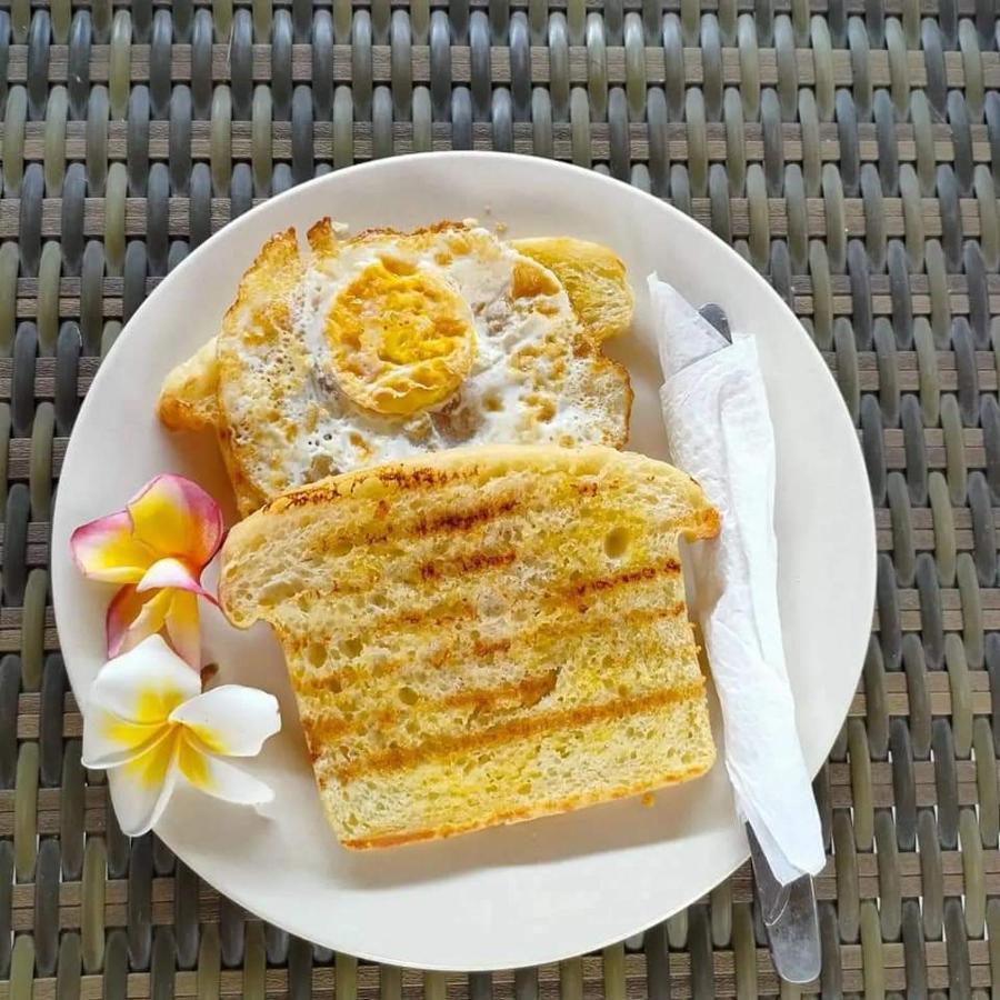 Dharma Homestay ปาดังไบ ภายนอก รูปภาพ