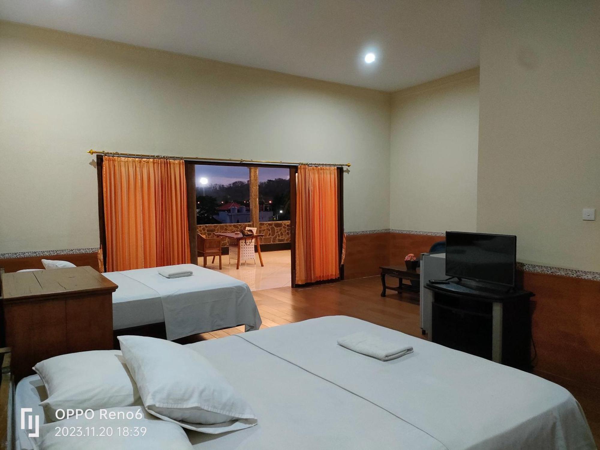 Dharma Homestay ปาดังไบ ภายนอก รูปภาพ