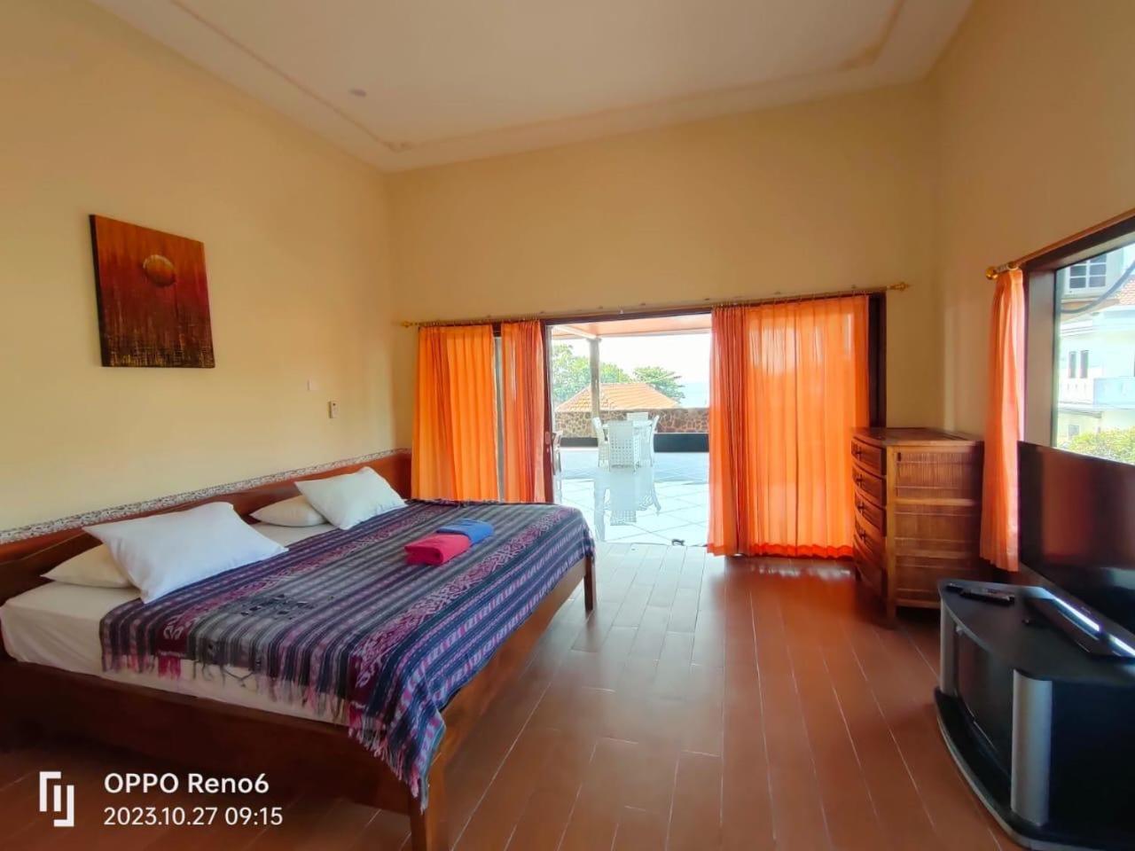Dharma Homestay ปาดังไบ ภายนอก รูปภาพ